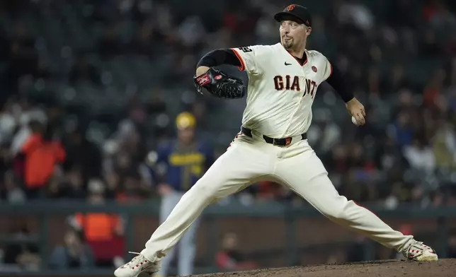 San Francisco Giants' Blake Snell pitches to a Milwaukee Brewers batter during the fourth inning of a baseball game Wednesday, Sept. 11, 2024, in San Francisco. (AP Photo/Godofredo A. Vásquez)