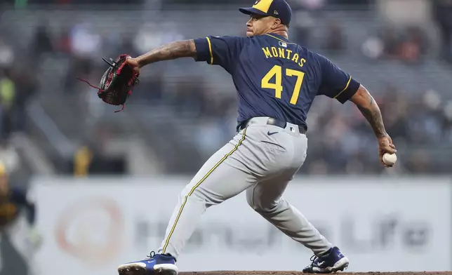 Milwaukee Brewers' Frankie Montas pitches to a San Francisco Giants batter during the first inning of a baseball game in San Francisco, Thursday, Sept. 12, 2024. (AP Photo/Kavin Mistry)