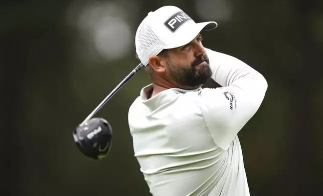 England's Matthew Baldwin tees off the 8th during day two of the 2024 BMW PGA Championship at Wentworth Golf Club in Virginia Water, England, Friday, Sept. 20, 2024. (Zac Goodwin/PA via AP)