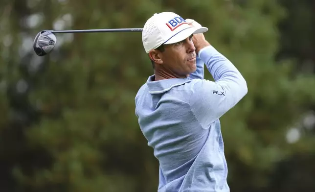 Billy Horschel of the U.S. tees off the 8th during day two of the 2024 BMW PGA Championship at Wentworth Golf Club in Virginia Water, England, Friday, Sept. 20, 2024. (Zac Goodwin/PA via AP)