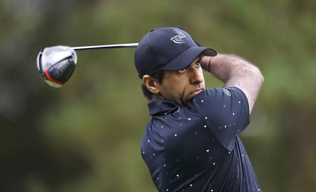 England's Aaron Rai tees off the 8th during day two of the 2024 BMW PGA Championship at Wentworth Golf Club in Virginia Water, England, Friday, Sept. 20, 2024. (Zac Goodwin/PA via AP)