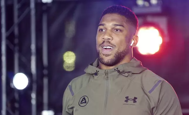 British boxer Anthony Joshua arrives at the Odeon Luxe Leicester Square, London, Tuesday Sept.17, 2024. (Bradley Collyer/PA via AP)