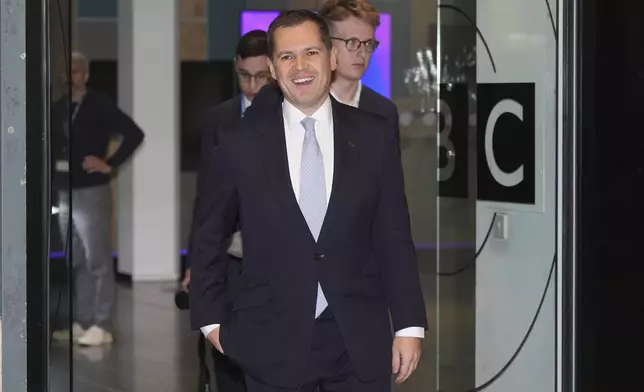 Former Immigration Minister Robert Jenrick leaves after appearing on the BBC One current affairs programme, Sunday with Laura Kuenssberg, ahead of the Conservatives annual conference where a new leader will be chosen, in Birmingham, England, Sunday Sept. 29, 2024. (Jacob King/PA via AP)