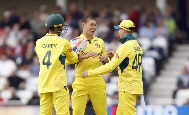 Australia's Marnus Labuschagne celebrates taking the wicket of England's Ben Duckett, not pictured, during the first one day international match at Trent Bridge, Nottingham, England, Thursday, Sept. 19, 2024. (Nigel French/PA via AP)