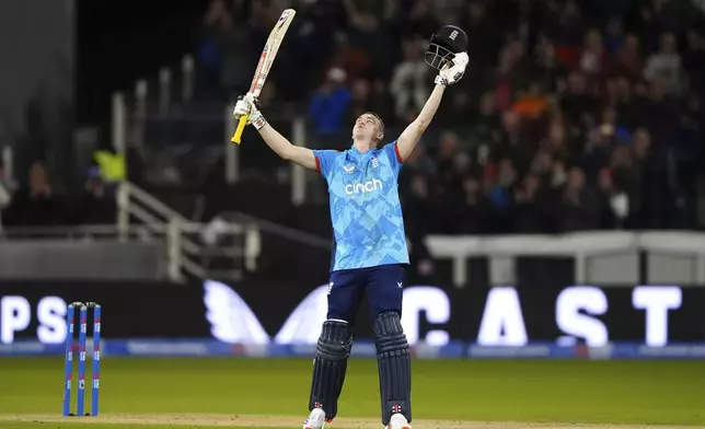 England's Harry Brook celebrates 100 runs during the third day international match at the Seat Unique Riverside, Chester-le-Street, County Durham, England, Tuesday, Sept. 24, 2024. (Owen Humphreys/PA via AP)