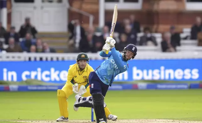 England's Ben Duckett bats during the fourth One Day International match between England and Australia at Lord's Cricket Ground, London, Friday Sept. 27, 2024. (John Walton/PA via AP)