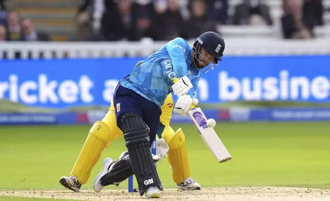 England's Ben Duckett bats during the fourth One Day International match between England and Australia at Lord's Cricket Ground, London, Friday Sept. 27, 2024. (John Walton/PA via AP)