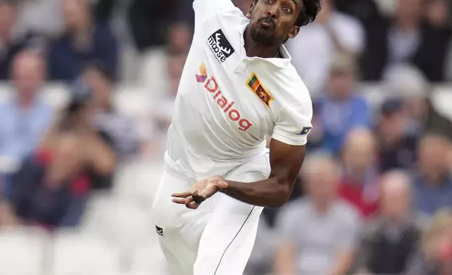 Sri Lanka's Milan Rathnayake bowls on day one of the Third Rothesay Men's Test match between England and Sri Lanka at The Kia Oval, in London, Friday Sept. 6, 2024. (John Walton/PA via AP)