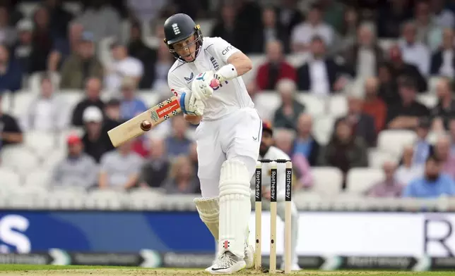 England's Ollie Pope hits for six on day one of the Third Rothesay Men's Test match between England and Sri Lanka at The Kia Oval, in London, Friday Sept. 6, 2024. (John Walton/PA via AP)