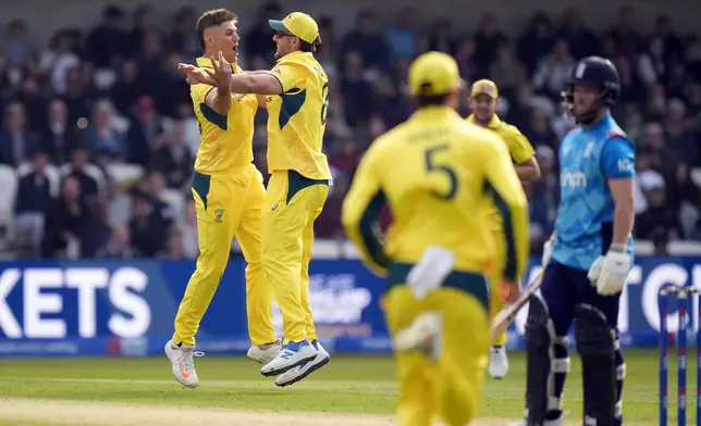 Australia's Aaron Hardie celebrates taking the wicket of England's Ben Duckett during the second One Day international match between England and Australia at Headingley, Leeds, Saturday Sept. 21, 2024. (Danny Lawson/PA via AP)