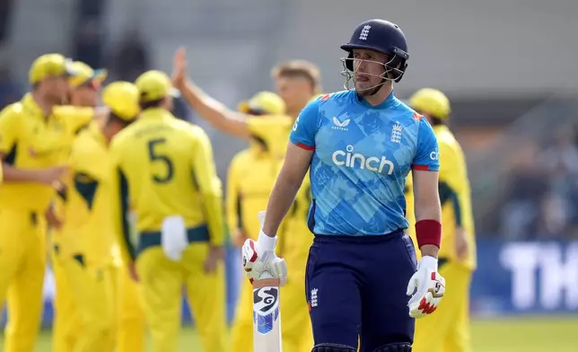 England's Liam Livingstone walks off the pitch after losing his wicket during the second One Day international match between England and Australia at Headingley, Leeds, Saturday Sept. 21, 2024. (Danny Lawson/PA via AP)