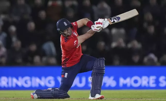 England's Liam Livingstone hits a four during the first IT20 cricket match between England and Australia in Southampton, England, Wednesday, Sept. 11, 2024. (Bradley Collyer/PA via AP)