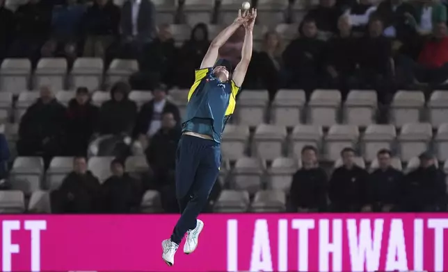 Australia's Cameron Green catches out England's Adil Rashid during the first IT20 cricket match between England and Australia in Southampton, England, Wednesday, Sept. 11, 2024. (Bradley Collyer/PA via AP)