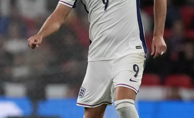 England's Harry Kane is in action during the Group F UEFA Nations League soccer match between England and Finland at Wembley Stadium in London, Tuesday, Sept. 10, 2024. (AP Photo/Frank Augstein)