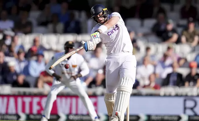 England's Jamie Smith batting during day three of the Third Rothesay Men's Test cricket match between England and Sri Lanka in London, England, Sunday, Sept. 8, 2024. (John Walton/PA via AP)