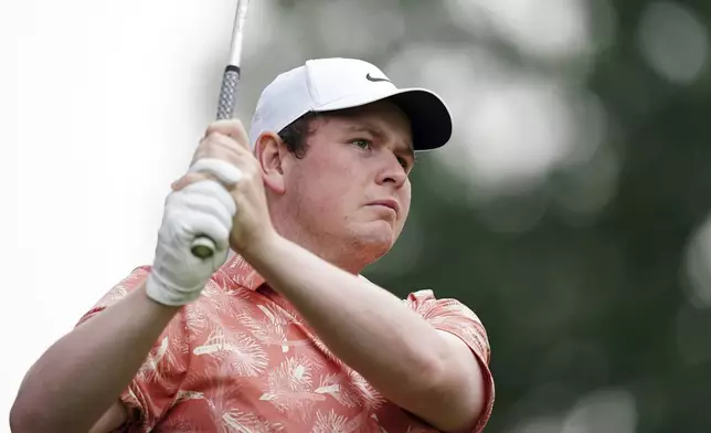 Robert MacIntyre attends the day one of the BMW PGA Championship at Wentworth Golf Club in Virginia Water, Surrey, England, Thursday, September 19, 2024. (Zac Goodwin/PA via AP)