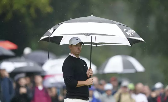 Northern Ireland's Rory McIlroy on the 4th hole during day three of the PGA Championship at Wentworth Golf Club in Virginia Water, England, Saturday Sept. 21, 2024. (Zac Goodwin/PA via AP)