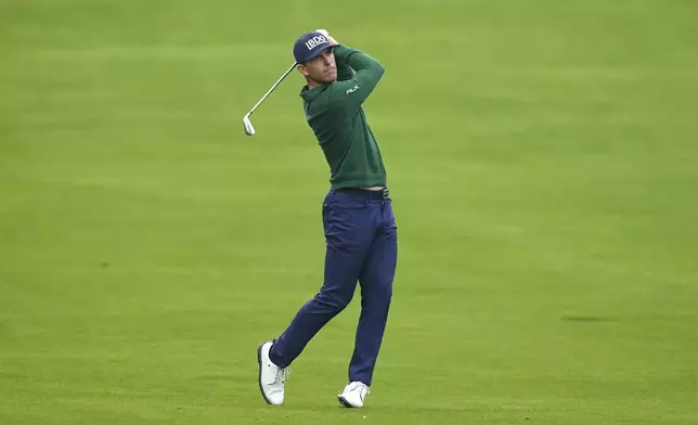 USA's Billy Horschel plays a shot on the 4th hole during day three of the PGA Championship at Wentworth Golf Club in Virginia Water, England, Saturday Sept. 21, 2024. (Zac Goodwin/PA via AP)