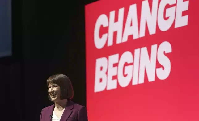 Britain's Chancellor of the Exchequer Rachel Reeves smiles after her speech during the Labour Party Conference in Liverpool, England, Monday, Sept. 23, 2024.(AP Photo/Jon Super)