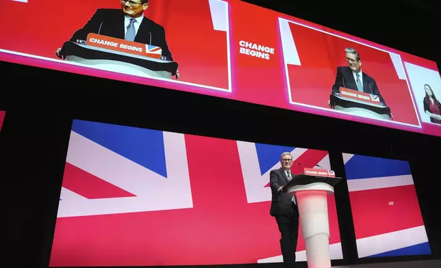 Britain's Prime Minister Keir Starmer addresses members at the Labour Party Conference in Liverpool, England, Tuesday, Sept. 24, 2024.(AP Photo/Jon Super)