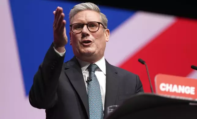 Britain's Prime Minister Keir Starmer addresses members at the Labour Party Conference in Liverpool, England, Tuesday, Sept. 24, 2024.(AP Photo/Jon Super)