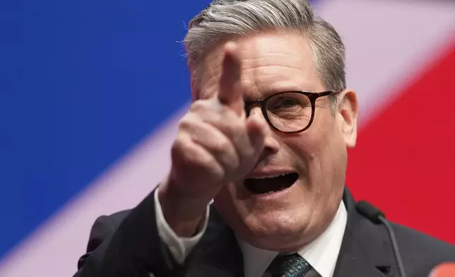 Britain's Prime Minister Keir Starmer addresses members at the Labour Party Conference in Liverpool, England, Tuesday, Sept. 24, 2024.(AP Photo/Jon Super)