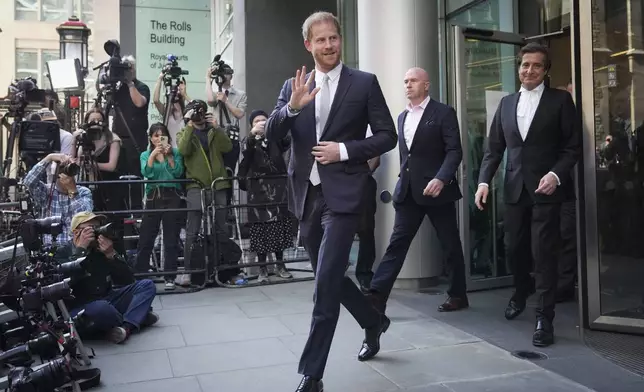 FILE - Prince Harry leaves the High Court after giving evidence in London, Wednesday, June 7, 2023. (AP Photo/Kin Cheung, File)