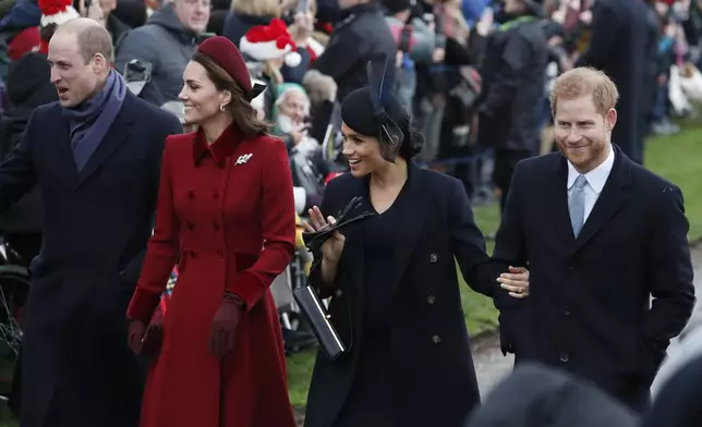 Britain's Prince William, left, Kate, Duchess of Cambridge, second left, Meghan Duchess of Sussex and Prince Harry, right, arrive to attend the Christmas day service at St Mary Magdalene Church in Sandringham in Norfolk, England, Tuesday, Dec. 25, 2018. (AP PhotoFrank Augstein)