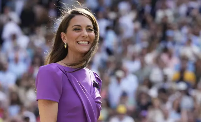 FILE - Britain's Kate, Princess of Wales waits to present the trophy to Carlos Alcaraz of Spain after he defeated Novak Djokovic of Serbia in the men's singles final at the Wimbledon tennis championships in London, July 14, 2024. (AP Photo/Kirsty Wigglesworth, File)