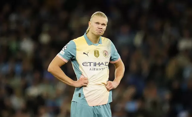 Manchester City's Erling Haaland reacts after a missed scoring opportunity during the Champions League opening phase soccer match between Manchester City and Inter Milan at the Etihad Stadium, in Manchester, England, Wednesday, Sept. 18, 2024. (AP Photo/Dave Thompson)