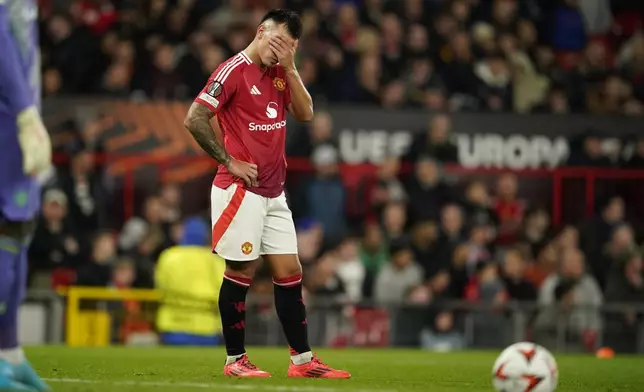 Manchester United's Lisandro Martinez reacts during the Europa League opening phase soccer match between Manchester United and Twente at the Old Trafford stadium in Manchester, England, Wednesday, Sept. 25, 2024. (AP Photo/Dave Thompson)