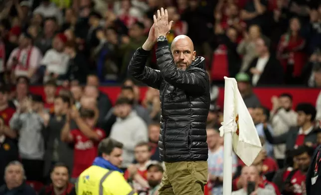 Manchester United's head coach Erik ten Hag claps hands prior to the English League Cup soccer match between Manchester United and Barnsley at Old Trafford, Manchester, England, Tuesday, Sept. 17, 2024. (AP Photo/Dave Thompson)