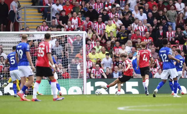 Southampton's Tyler Dibling scores his side's first goal of the game, during the English Premier League soccer match between Southampton and Ipswich Town, at St Mary's Stadium, in Southampton, England, Saturday, Sept. 21, 2024. (Adam Davy/PA via AP)