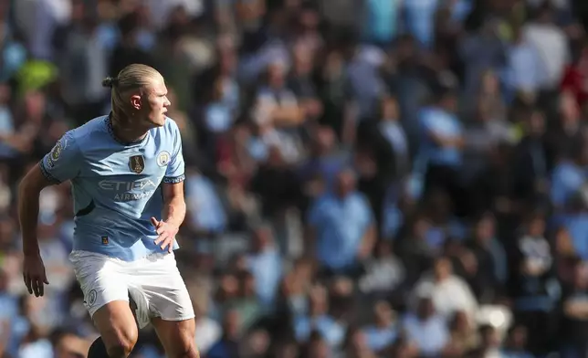 Manchester City's Erling Haaland runs during the English Premier League soccer match between Manchester City and Brentford at the Etihad Stadium in Manchester, England, Saturday, Sept. 14, 2024. (AP Photo/Scott Heppel)