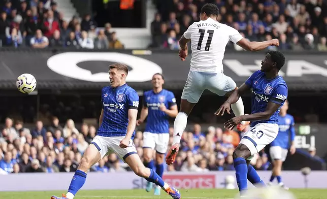 Aston Villa's Ollie Watkins scores his side's second goal during the British Premier League soccer match between Ipswich Town and Aston Villa at Portman Road, Ipswich, England, Sunday Sept. 29, 2024. (Zac Goodwin/PA via AP)