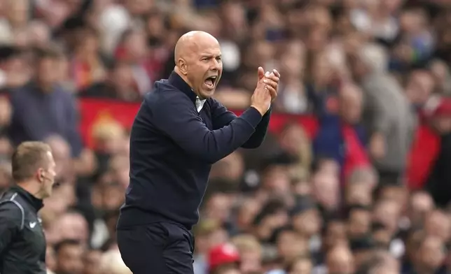 Liverpool's manager Arne Slot reacts during the English Premier League soccer match between Manchester United and Liverpool at Old Trafford, Sunday, Sept. 1, 2024, in Manchester, England. (AP Photo/Dave Thompson)