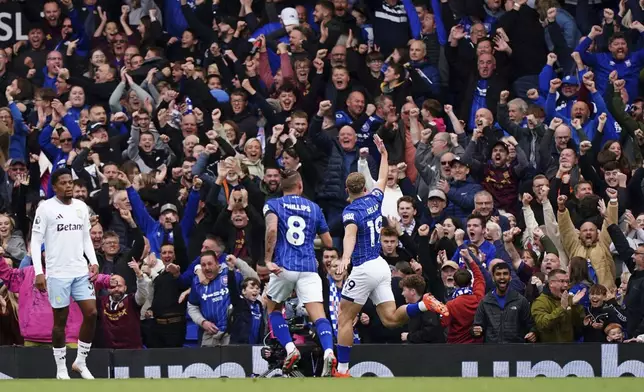 Ipswich Town's Liam Delap (right) celebrates scoring during the British Premier League soccer match between Ipswich Town and Aston Villa at Portman Road, Ipswich, England, Sunday Sept. 29, 2024. (Zac Goodwin/PA via AP)