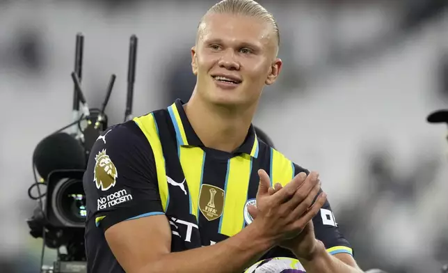 Manchester City's Erling Haaland reacts at the end of the English Premier League soccer match between West Ham United and Manchester City at the London Stadium in London, England, Saturday, Aug. 31, 2024. (AP Photo/Frank Augstein)