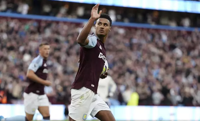 Aston Villa's Ollie Watkins celebrates scoring his side's second goal during the British Premier League soccer match between Aston Villa and Everton, Villa Park, Birmingham, England, Saturday Sept. 14, 2024. (Bradley Collyer/PA via AP)