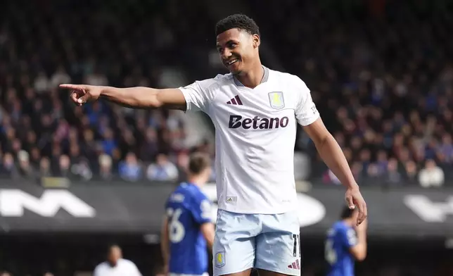 Aston Villa's Ollie Watkins celebrates scoring his side's second goal during the British Premier League soccer match between Ipswich Town and Aston Villa at Portman Road, Ipswich, England, Sunday Sept. 29, 2024. (Zac Goodwin/PA via AP)