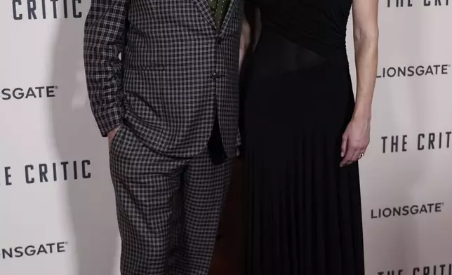 Ian McKellen, with Gemma Arterton, as they pose for photographers upon arrival at the European Premiere of the The Critic, In London, Monday, Sept. 2, 2024. (AP Photo/Alberto Pezzali)