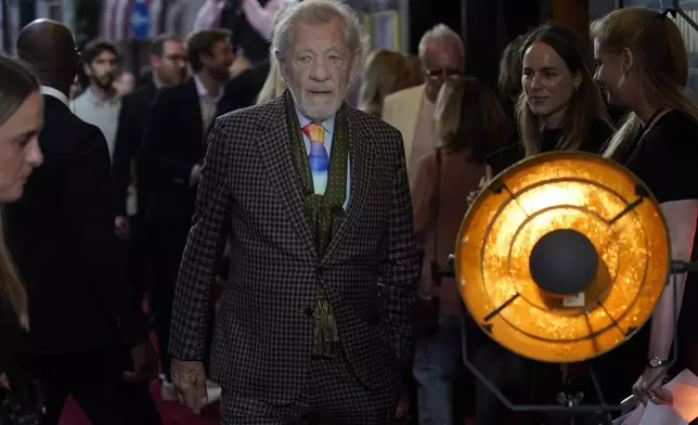 Ian McKellen, walks towards the photographers upon arrival at the European Premiere of the The Critic, In London, Monday, Sept. 2, 2024. (AP Photo/Alberto Pezzali)