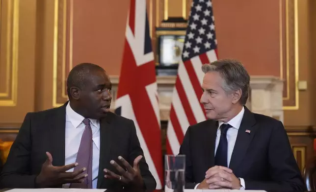 Secretary of State Antony Blinken, right, listens to Britain's Foreign Secretary David Lammy, in a strategic dialogue meeting at the Foreign, Commonwealth and Development Office (FCDO) in London, Tuesday, Sept. 10, 2024. (AP Photo/Mark Schiefelbein, Pool)