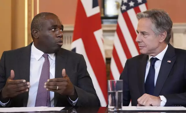 U.S. Secretary of State Antony Blinken, right, listens to Britain's Foreign Secretary David Lammy, in a strategic dialogue meeting at the Foreign, Commonwealth and Development Office (FCDO) in London, Tuesday, Sept. 10, 2024. (AP Photo/Mark Schiefelbein, Pool)