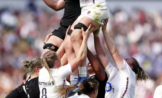 England's Abbie Ward wins the ball from the lineout during the Women's International match between England and New Zealand at Allianz Stadium, Twickenham, London, Saturday Sept. 14, 2024. (David Davies/PA via AP)