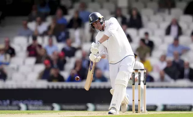 England's Dan Lawrence batting during day three of the Third Rothesay Men's Test cricket match between England and Sri Lanka in London, England, Sunday, Sept. 8, 2024. (John Walton/PA via AP)