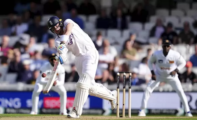 England's Jamie Smith batting during day three of the Third Rothesay Men's Test cricket match between England and Sri Lanka in London, England, Sunday, Sept. 8, 2024. (John Walton/PA via AP)