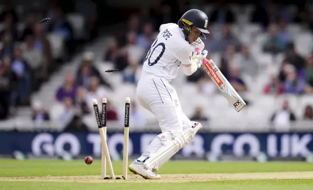 England's Ollie Pope is bowled Sri Lanka's Lahiru Kumara during day three of the Third Rothesay Men's Test cricket match between England and Sri Lanka in London, England, Sunday, Sept. 8, 2024. (John Walton/PA via AP)