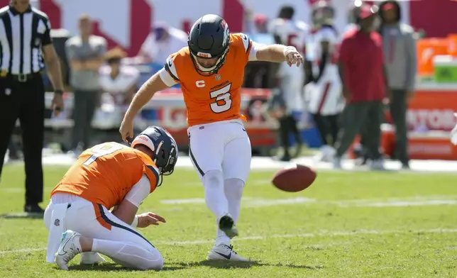 Denver Broncos place kicker Wil Lutz (3) kicks a 43-yard field goal against the Tampa Bay Buccaneers during the second half of an NFL football game, in Tampa, Fla. on Sunday, Sept. 22, 2024. (AP Photo/Chris O'Meara)