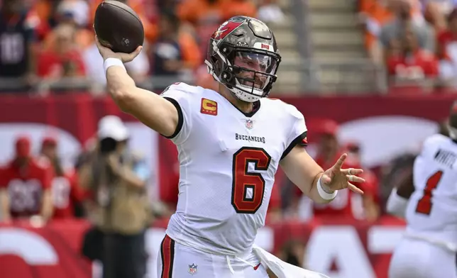 Tampa Bay Buccaneers quarterback Baker Mayfield (6) throws a pass against the Denver Broncos during the first half of an NFL football game, in Tampa, Fla. on Sunday, Sept. 22, 2024. (AP Photo/Jason Behnken)